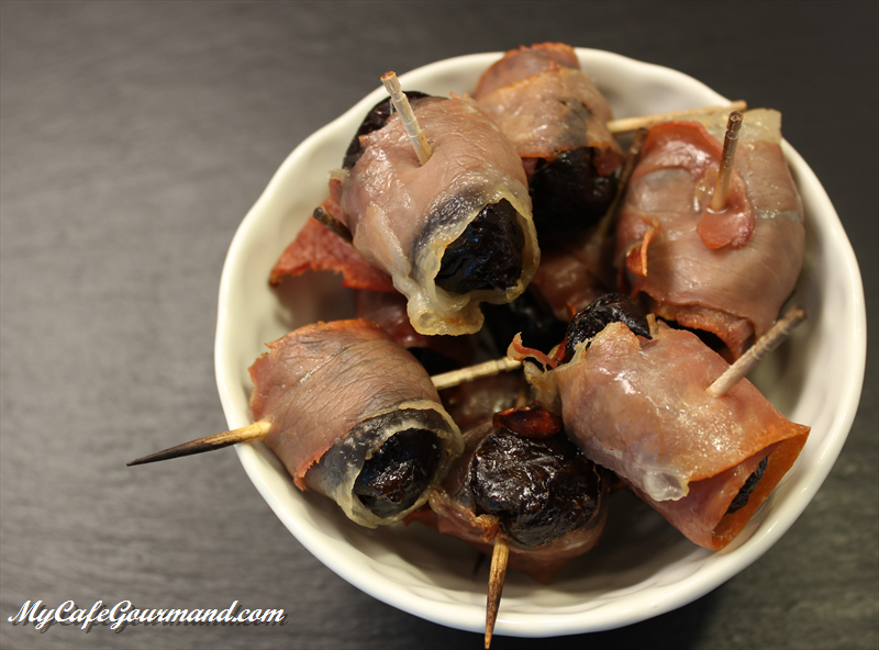 Prunes with prosciutto